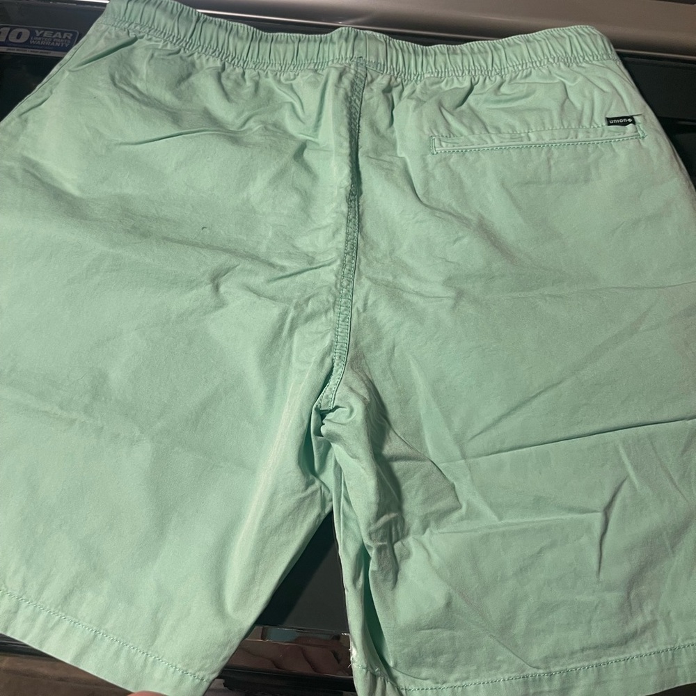 New turquoise cargo style shorts.